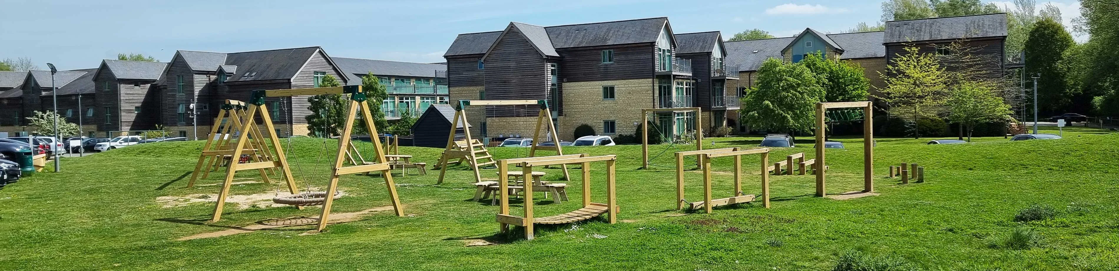 Hotel play area with play trails and swings